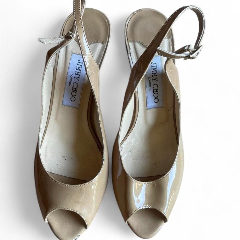 Classic Jimmy Choo London nude/beige patent leather slingback pumps. Sexy peep-t